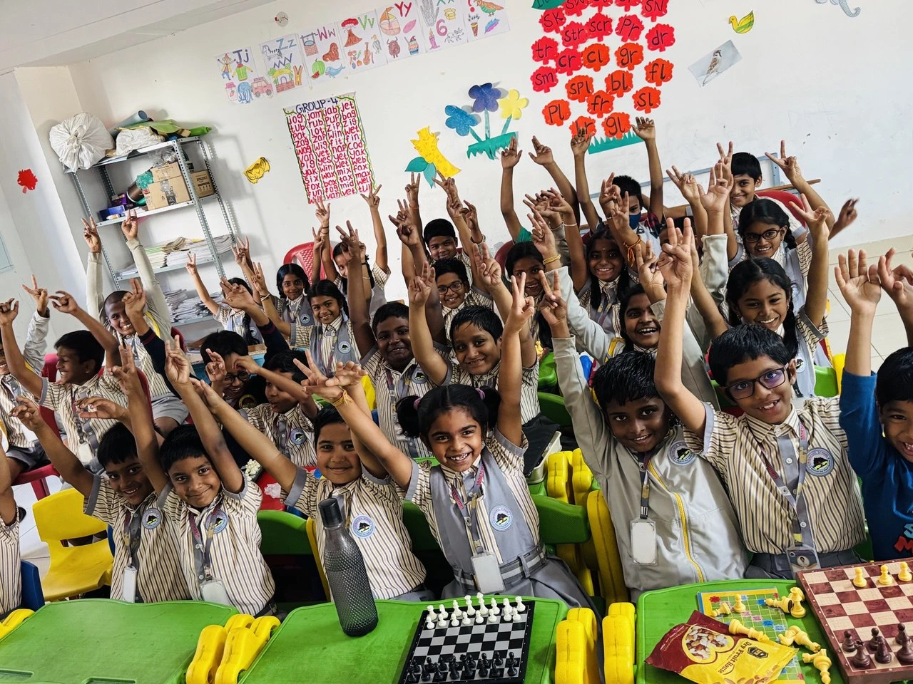 Young students learning chess as part of school curriculum by GKS Academy