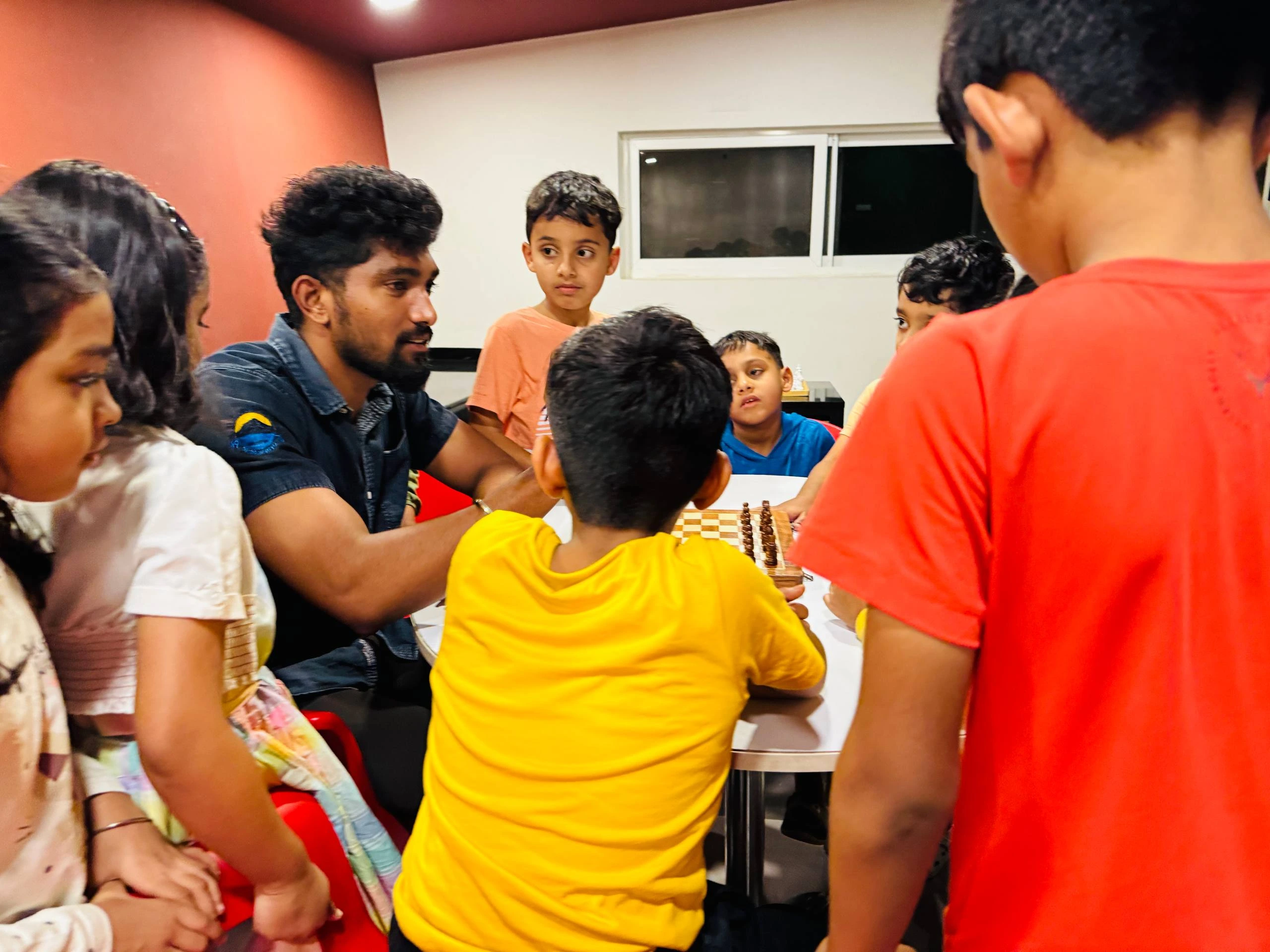 Group of kids practicing chess at GKS Academy
